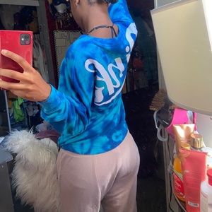 tie-dye vs pink sweatshirt